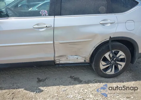 2016 Honda Cr-V Touring z USA, uszkodzony, nr VIN 5J6RM4H96GL065296